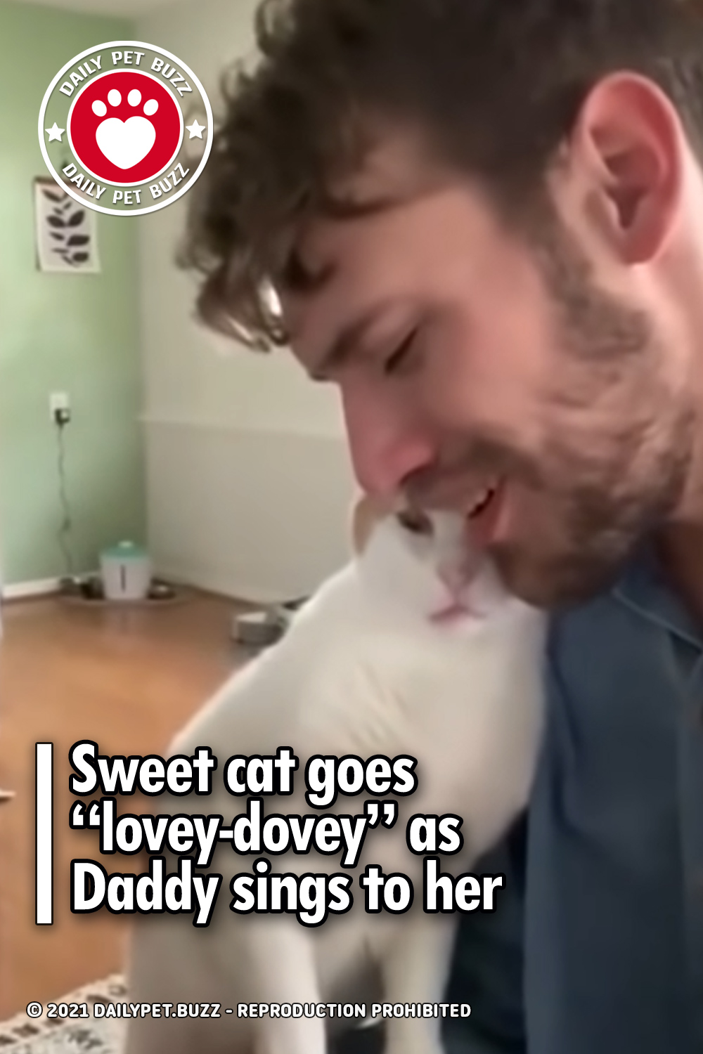 Sweet cat goes “lovey-dovey” as Daddy sings to her